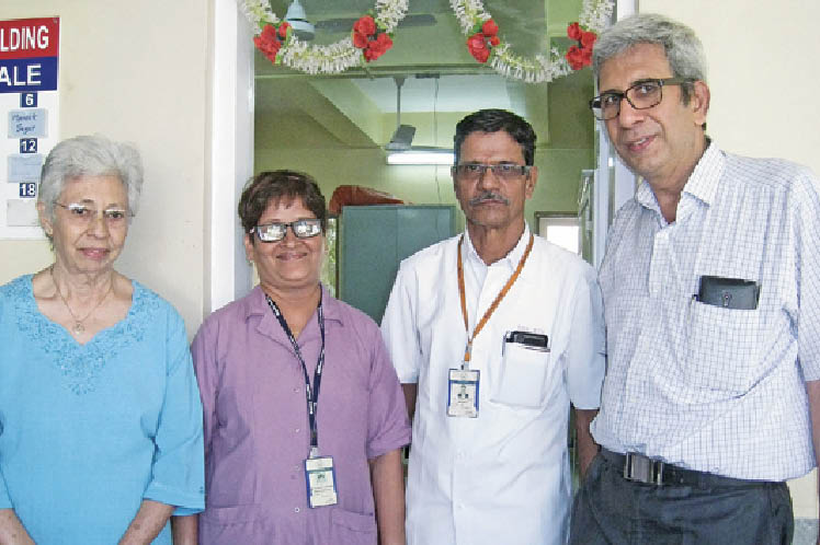 The Efficient And Effective Team of Masina consisting of Mrs. Zarine Cyrusi (extreme right) and Medical Director, Dr. Vispi Jokhi (extreme left).